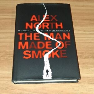 Book "The Man Made Of Smoke" By: Alex North